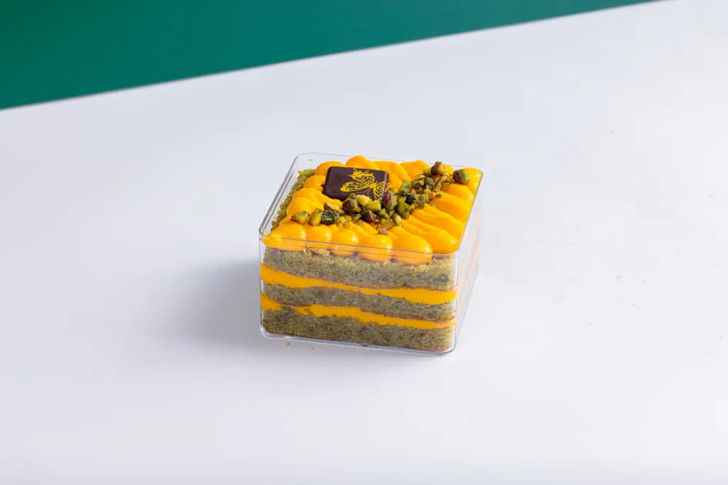 PISTACHIO SAFFRON CAKE SLICE 