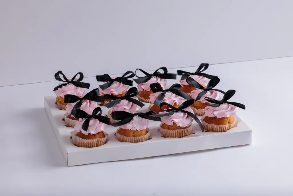 PINK CUP CAKE WITH RIBBON